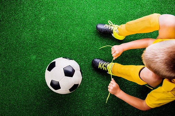 Kid playing soccer