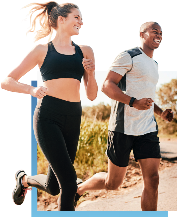 young, athletic woman and man enjoying a happy jog on a nice sunny day